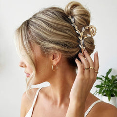 CAKURE gold claw clip in bridal setting adding glamorous finishing touch
