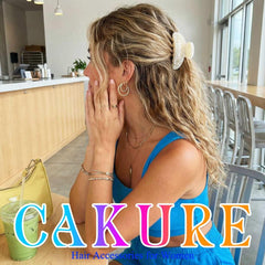 CAKURE styled with outfit in a lifestyle scene showing accessory versatility