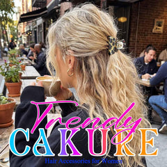 CAKURE clip in hand shows compact size and travel-friendly benefit