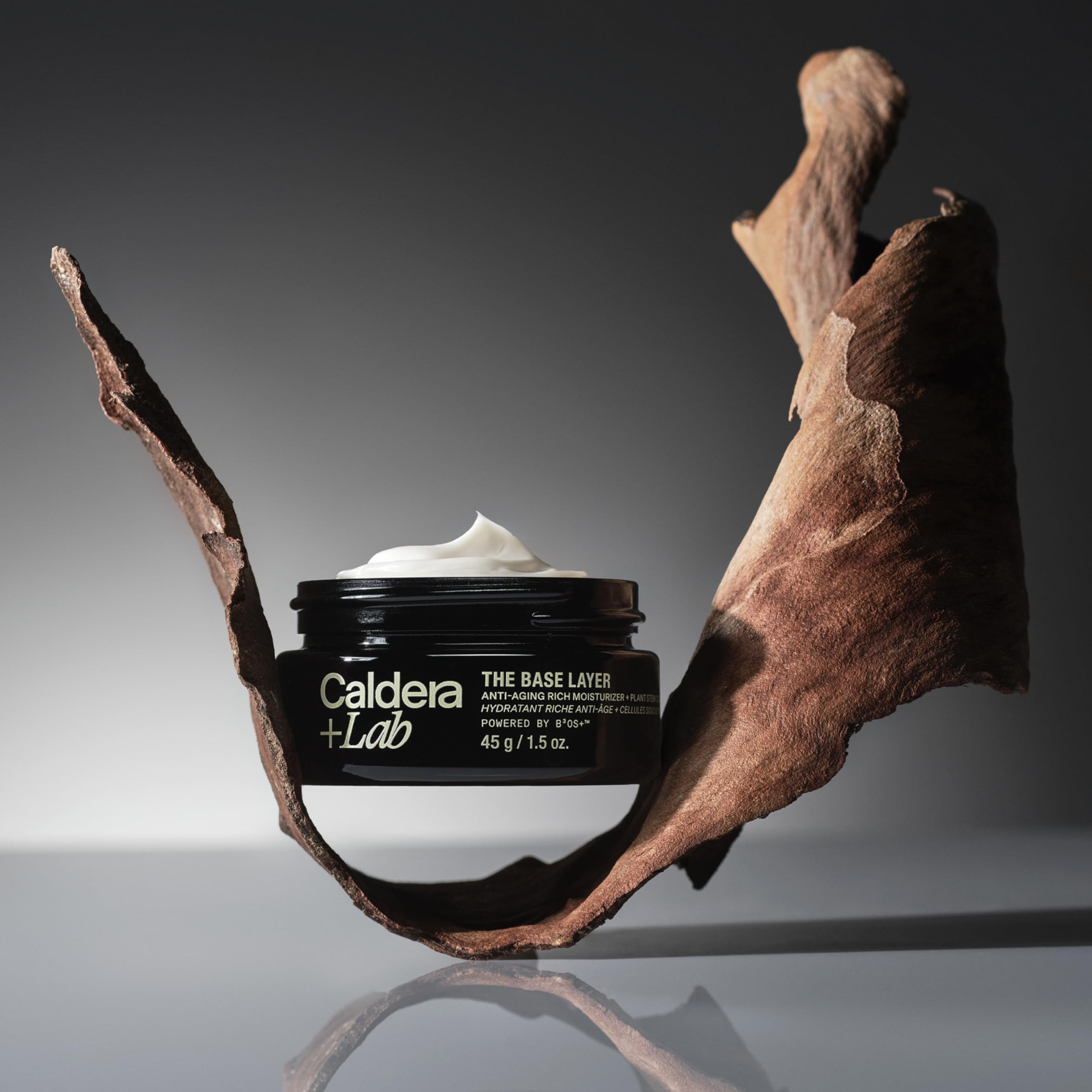 Caldera + Lab jar beside botanical ingredients emphasizing natural antioxidant benefits