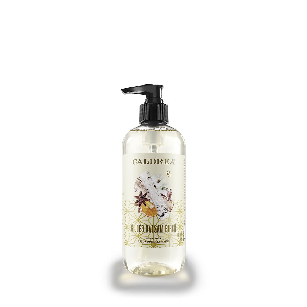 Caldrea front packaging showing bottle and warm balsam fragrance benefit