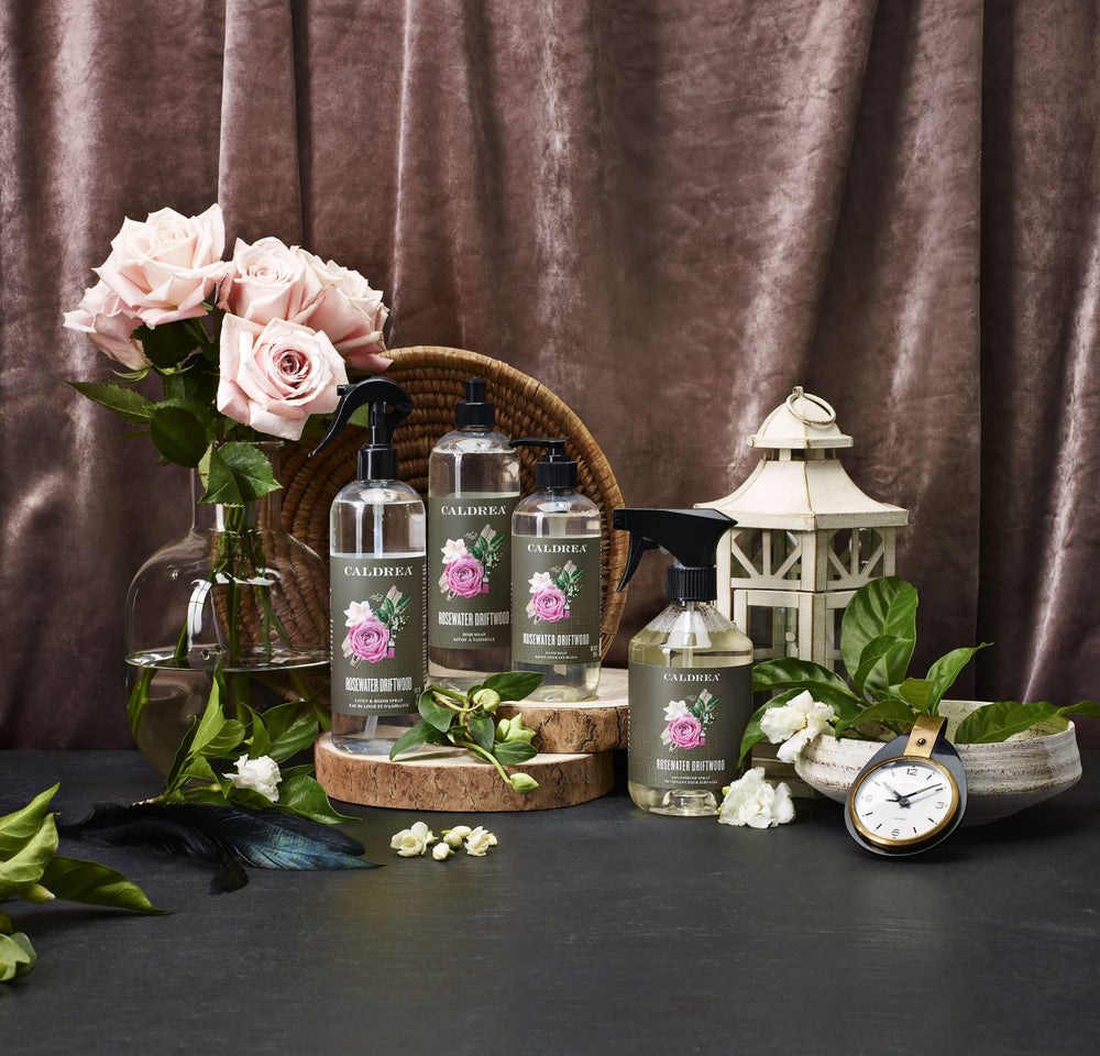 Caldrea bottle on sink in kitchen setting adding fragrance and style