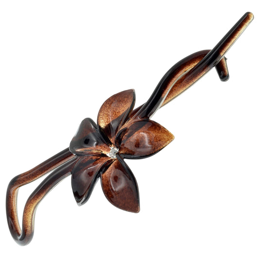 Camila barrette front view showing tortoise shell finish and flower accent for chic styling