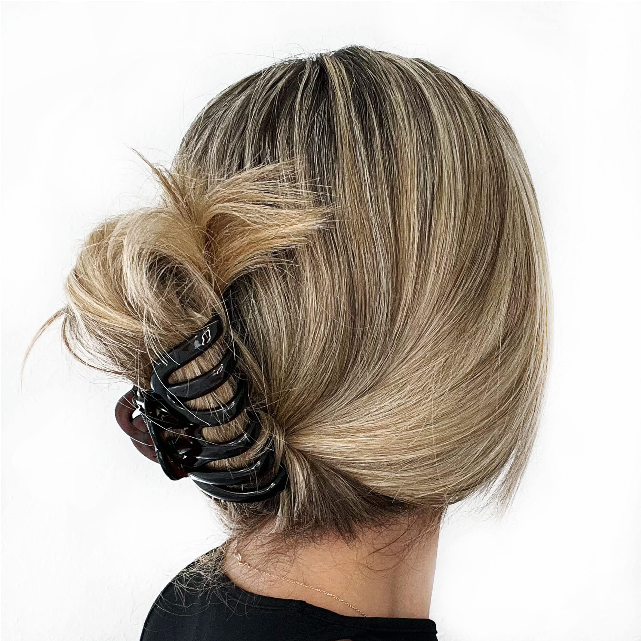 Camila Paris clip held in hand showing 3.5-inch scale and ease