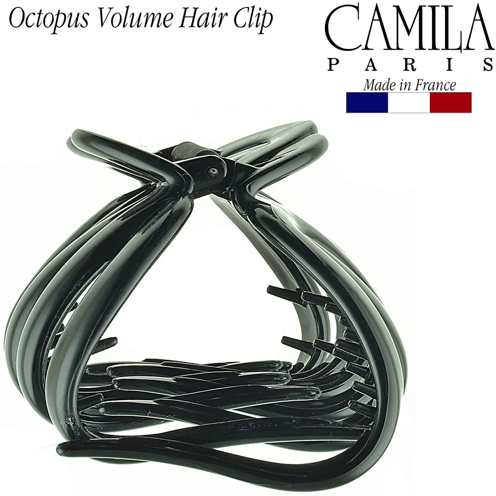 Camila Paris clipped in half-up hairstyle showing versatile styling