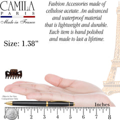 Camila Paris clips holding hair in use for quick half-up look and tidy styling