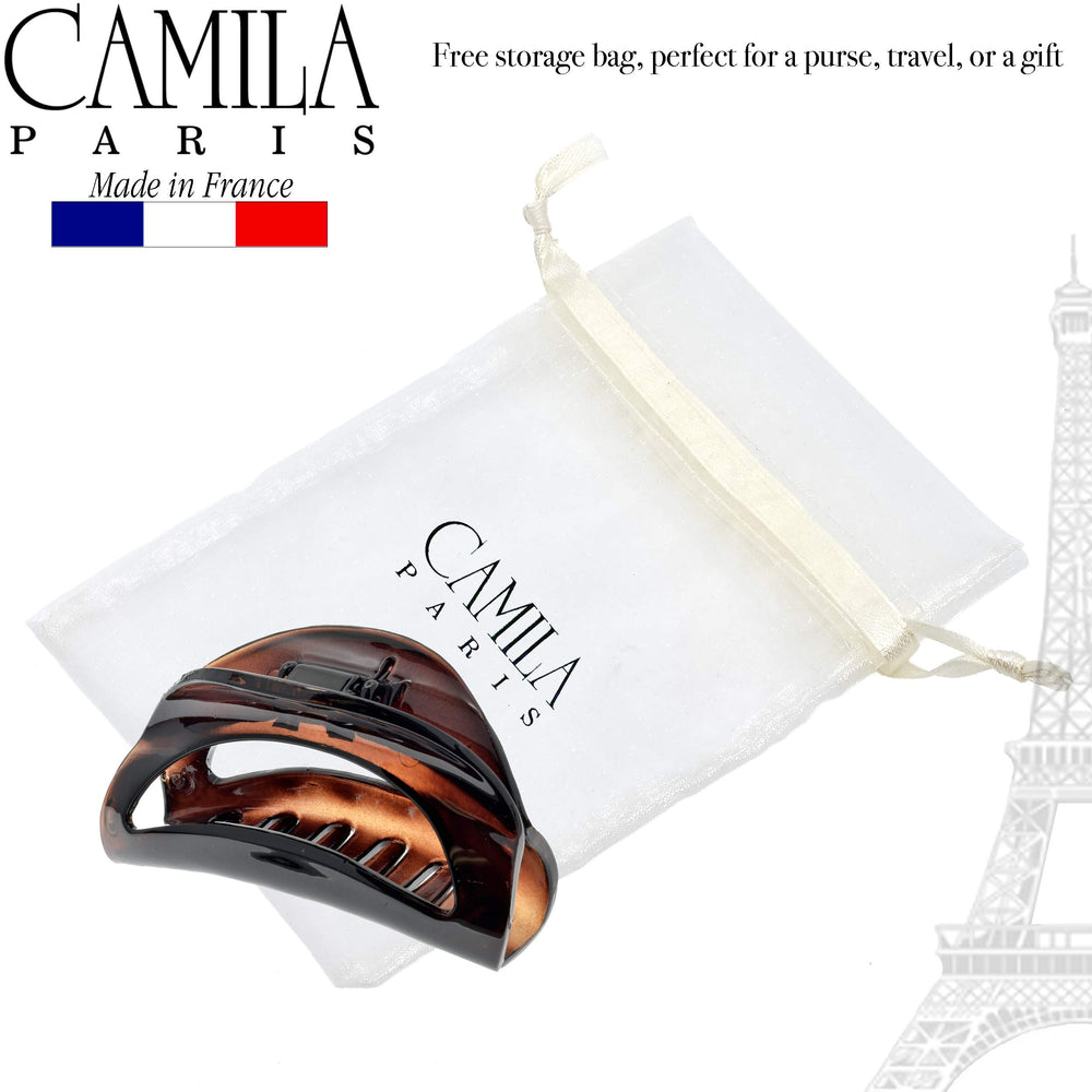 Camila Paris open clip showing spring mechanism for firm no-slip grip
