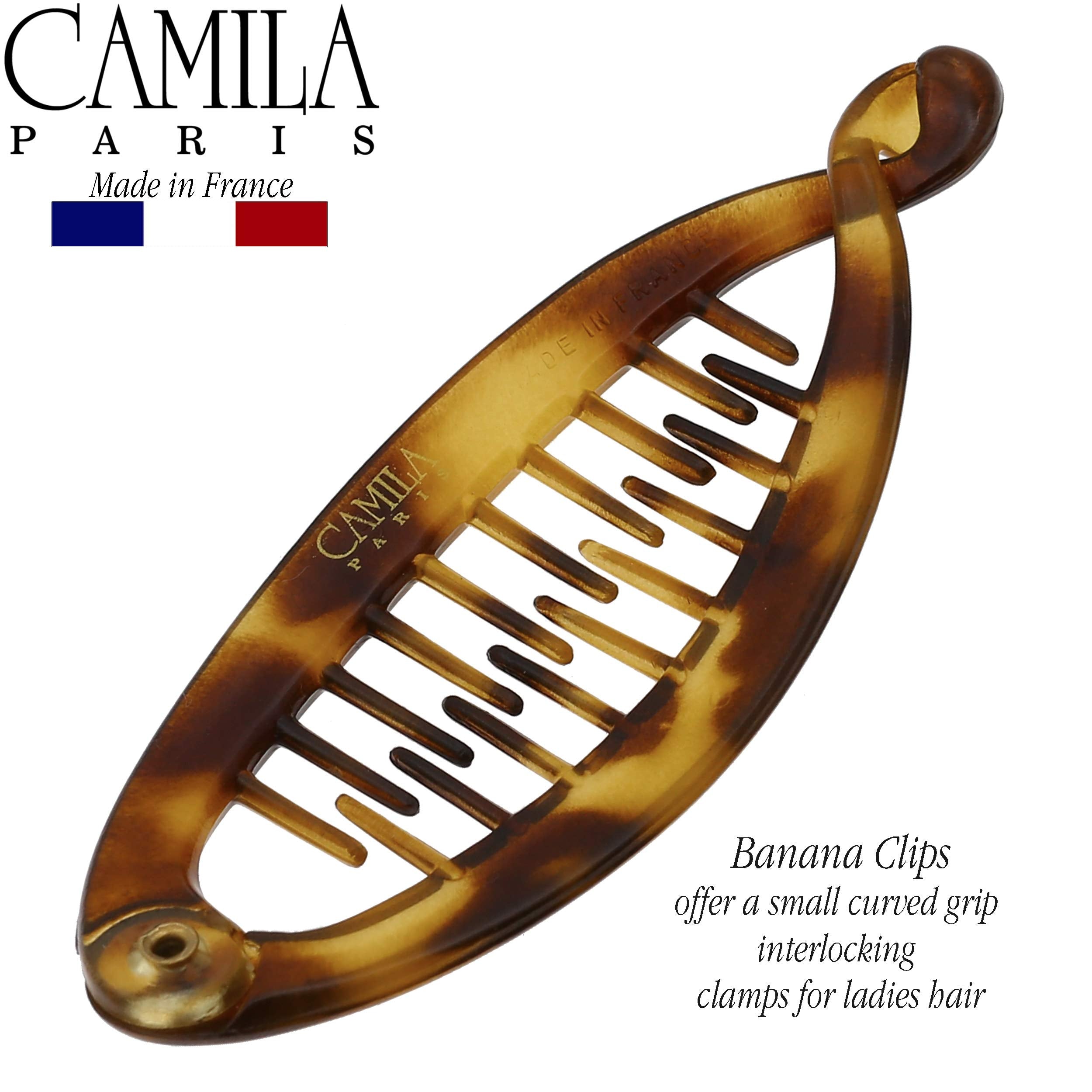 Camila Paris beside inch ruler showing true 3.5-inch small scale