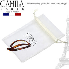 Camila Paris used to secure a low bun illustrating strong hold for formal looks