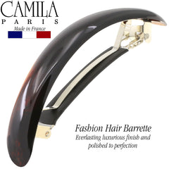 Camila Paris shown holding half-up hairstyle demonstrating reliable no-slip grip