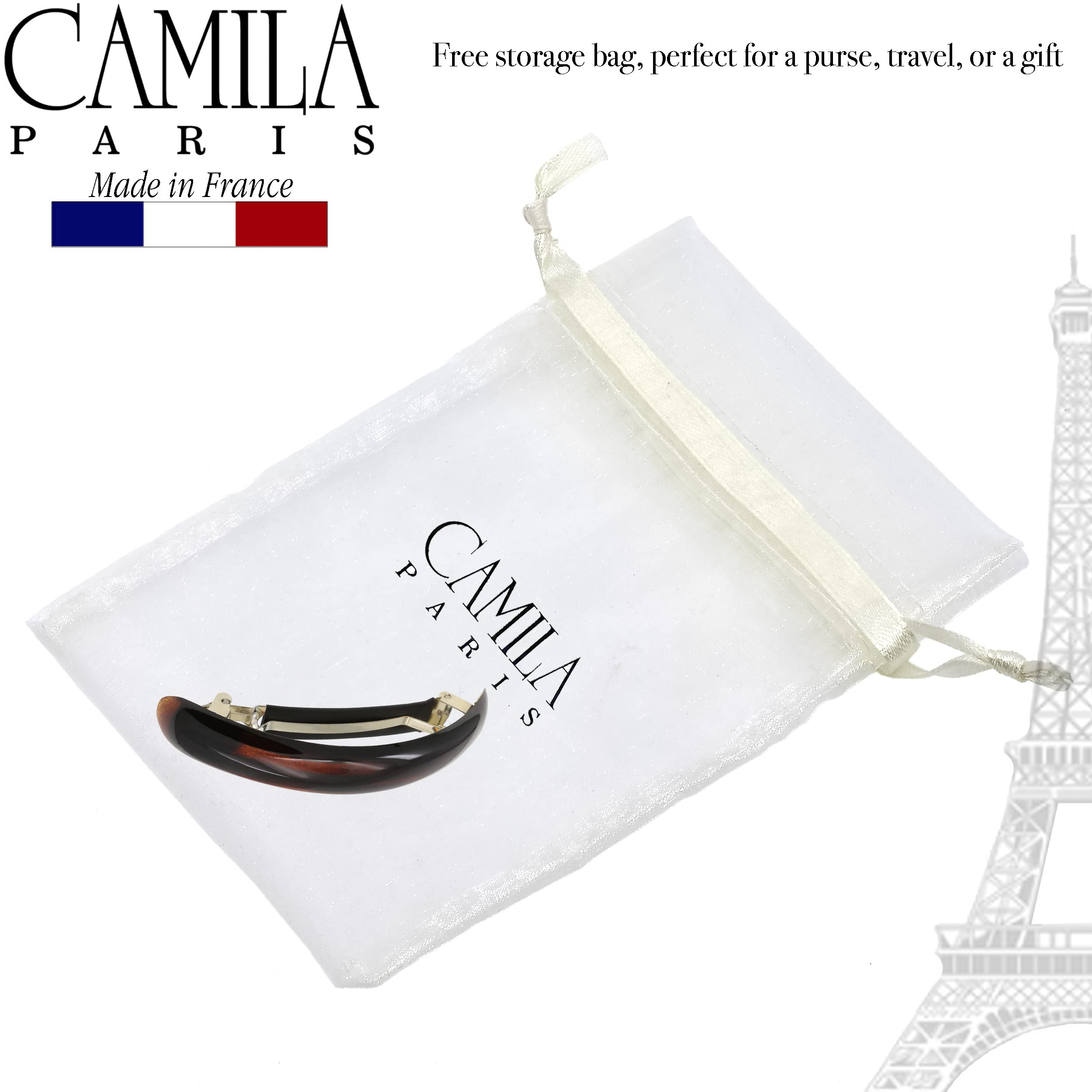Camila Paris next to a hand for scale showing compact 3.5-inch size and comfort
