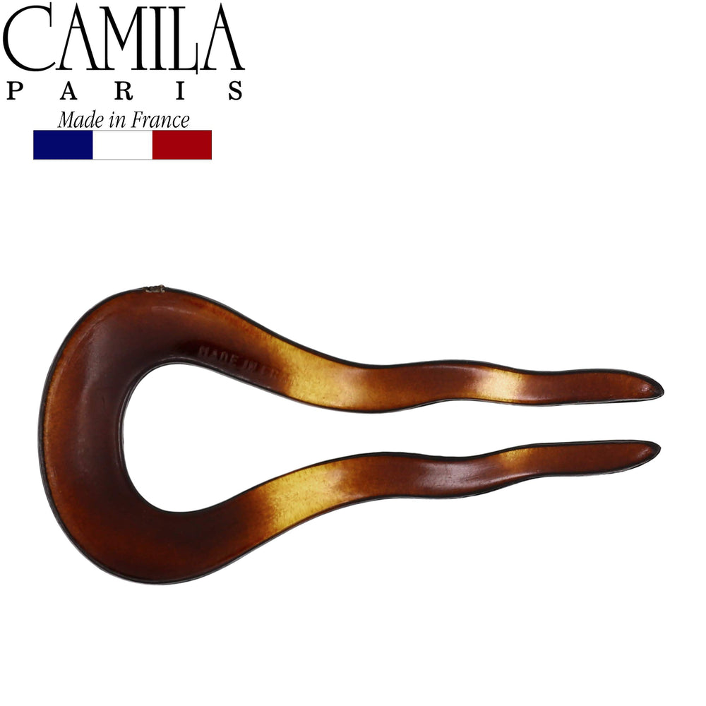 Camila Paris two sticks crossed for stronger hold on thicker hair