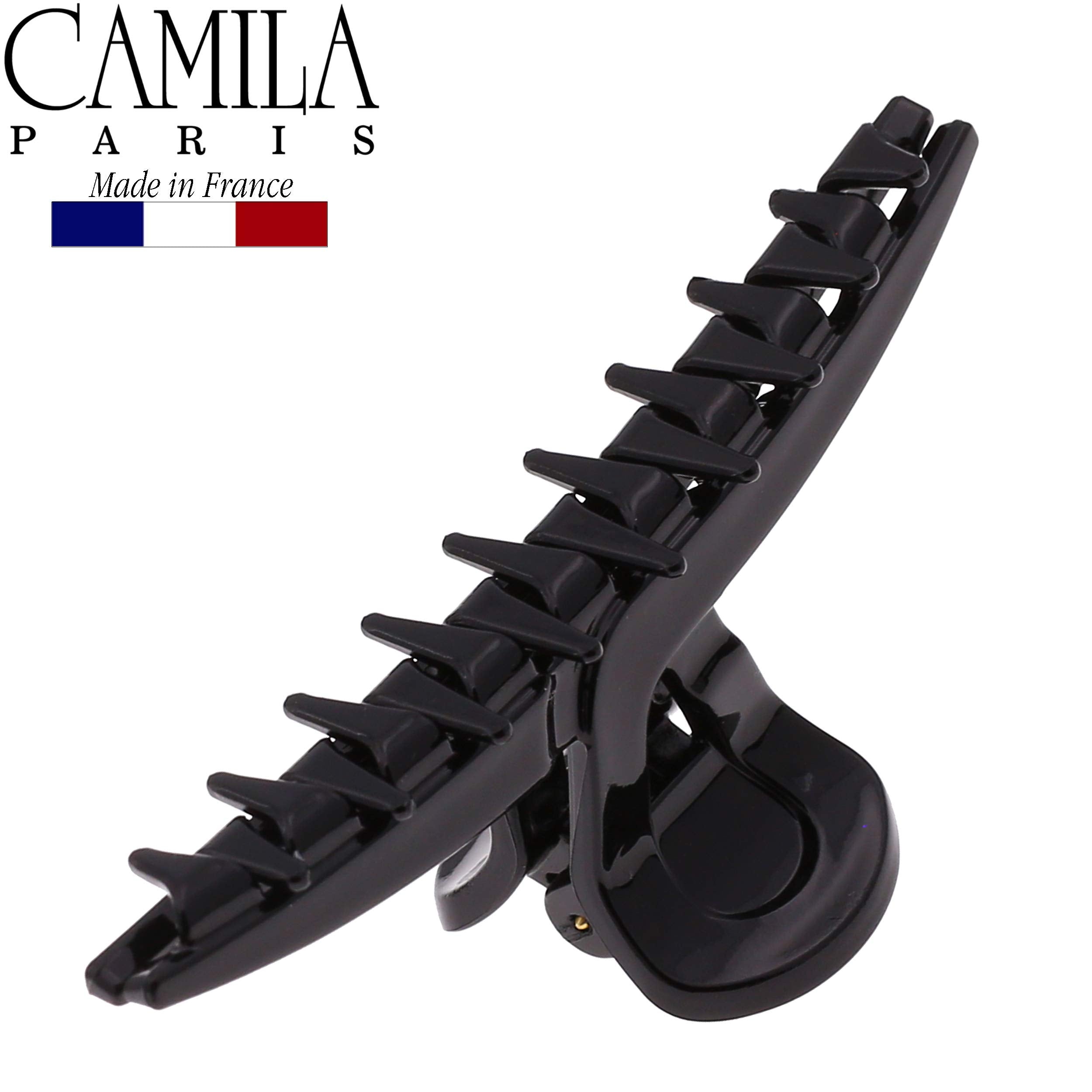 Camila Paris clipped in half-up style for quick everyday elegance