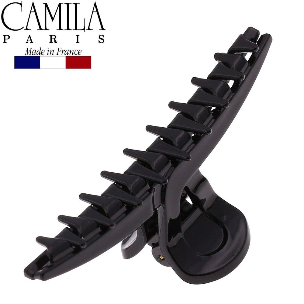 Camila Paris clipped in half-up style for quick everyday elegance