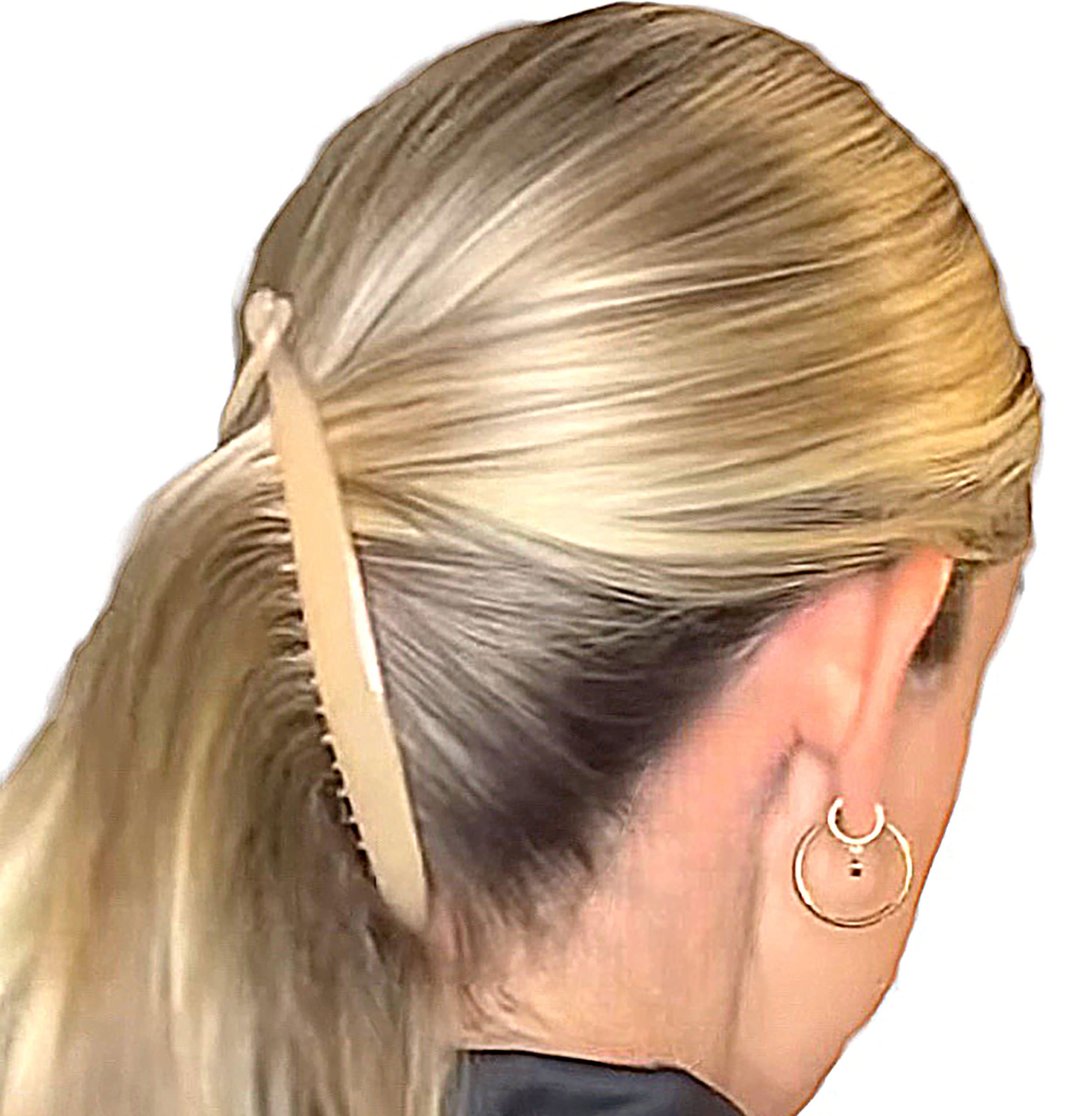 Camila Paris half-up hairstyle on model showing effortless styling benefit