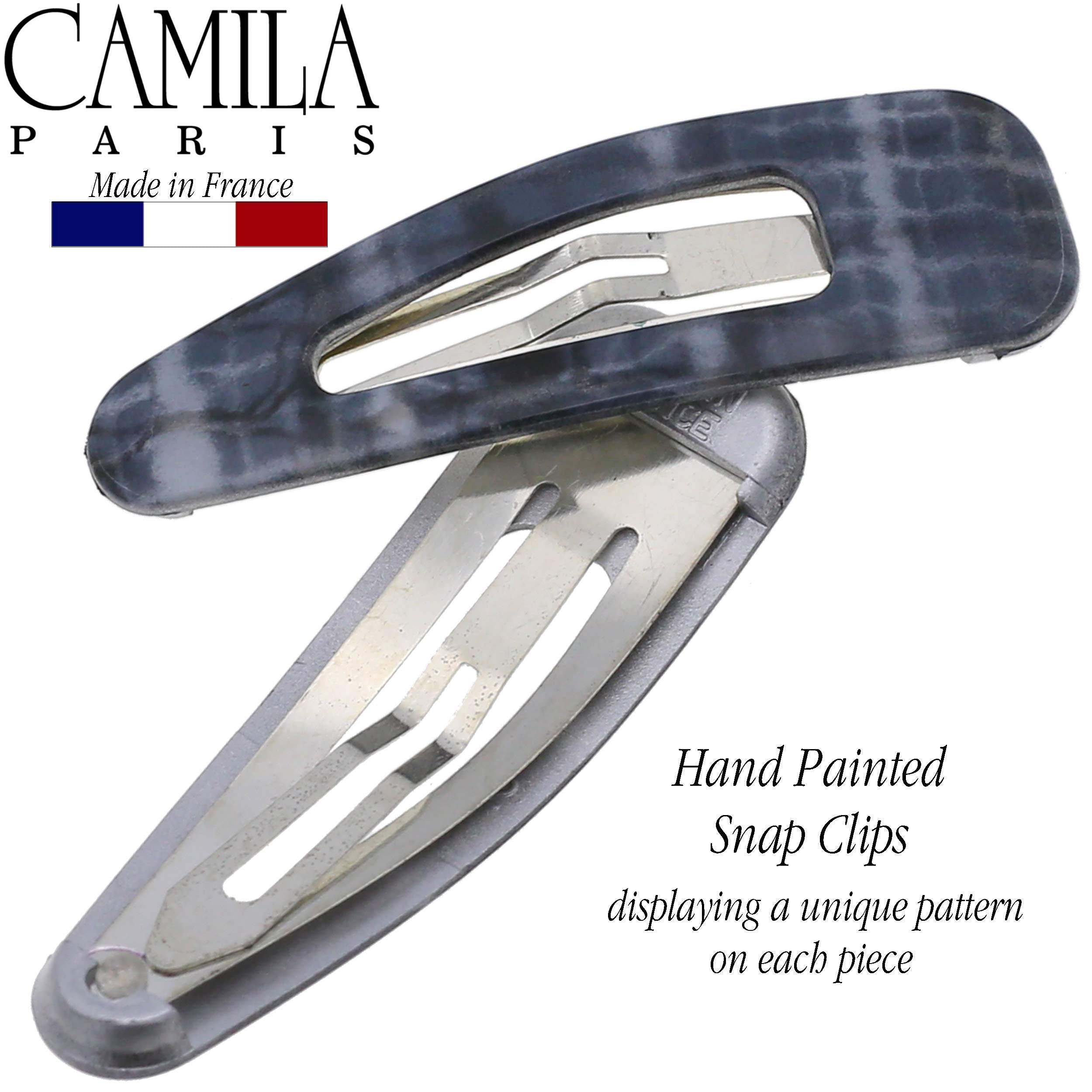 Camila Paris clip in hair side profile securing a section for neat styling