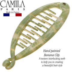 Camila Paris in hair demonstrating half-up style and tidy finish