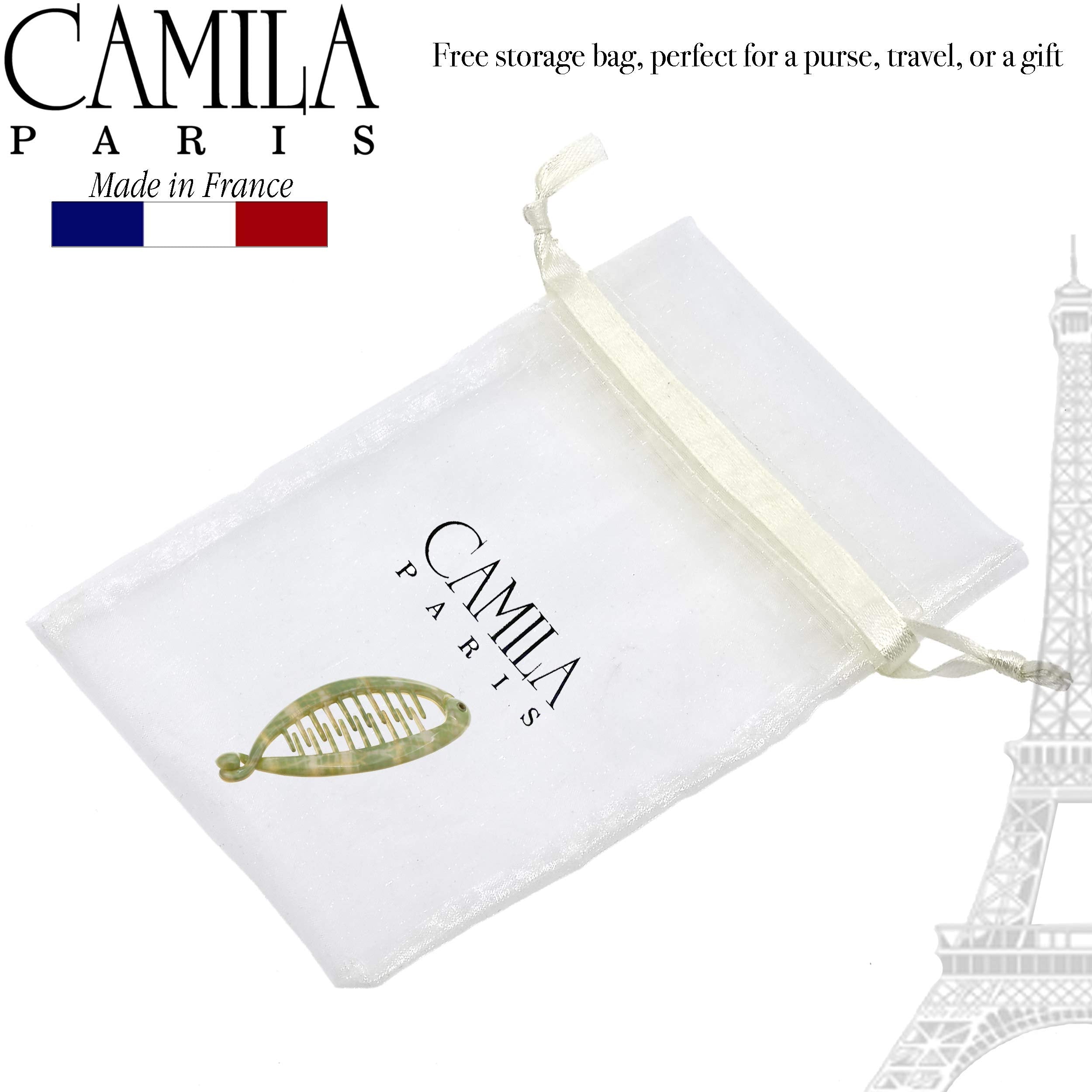Camila Paris beside ruler showing true 3.5-inch extra-small scale