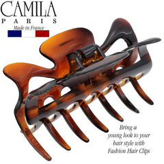 Camila Paris scale on hand illustrating 3.5-inch size and lightweight comfort