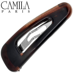Camila Paris clip holding thick hair section showing strong no-slip grip