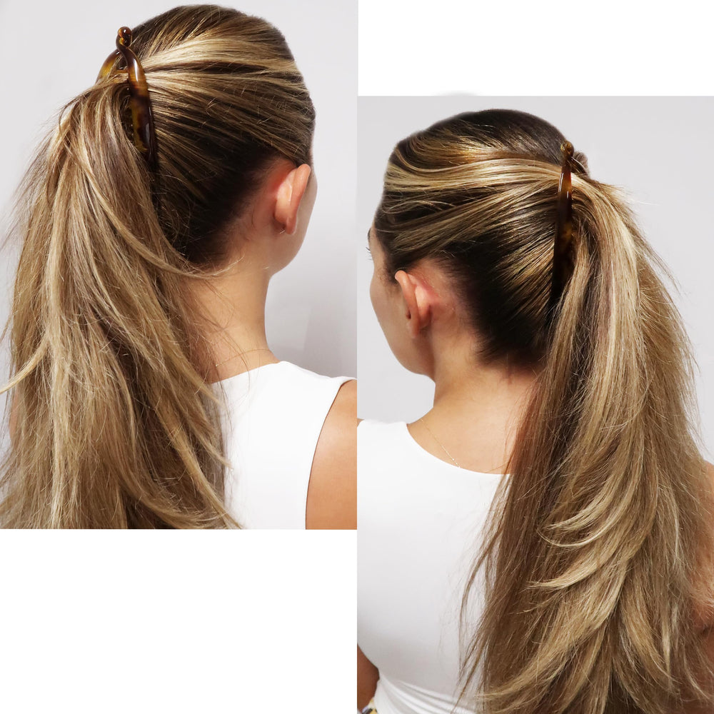 Camila holding a full thick ponytail to show reliable all-day hold