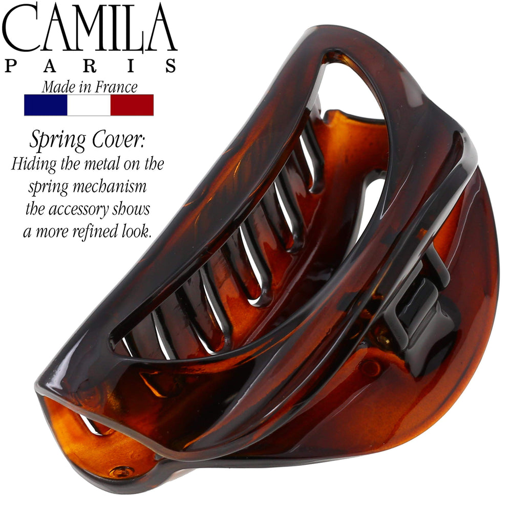 Camila Paris clip holding a bun for quick polished styling