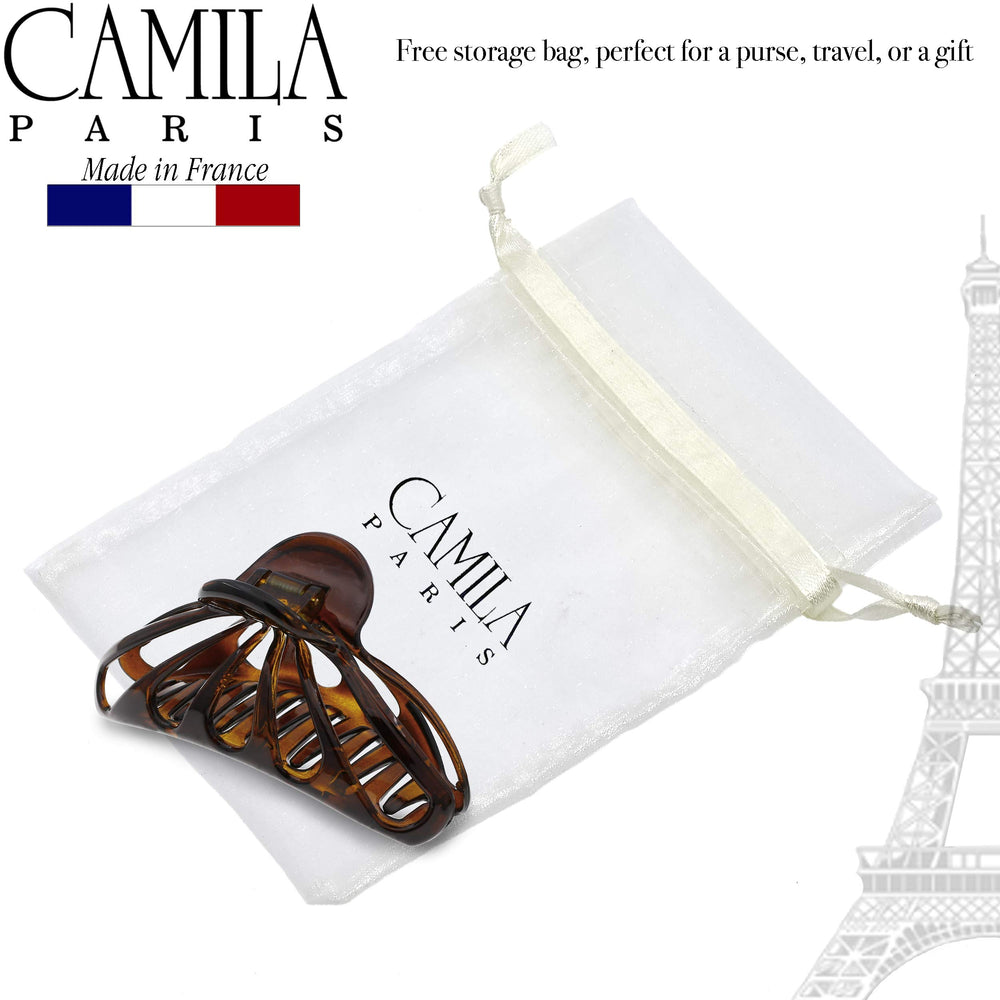 Camila Paris beside a hand for scale, demonstrates 4-inch size and capacity