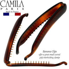 Camila Paris NV133 shown in hand to convey 3.75 inch size and portability
