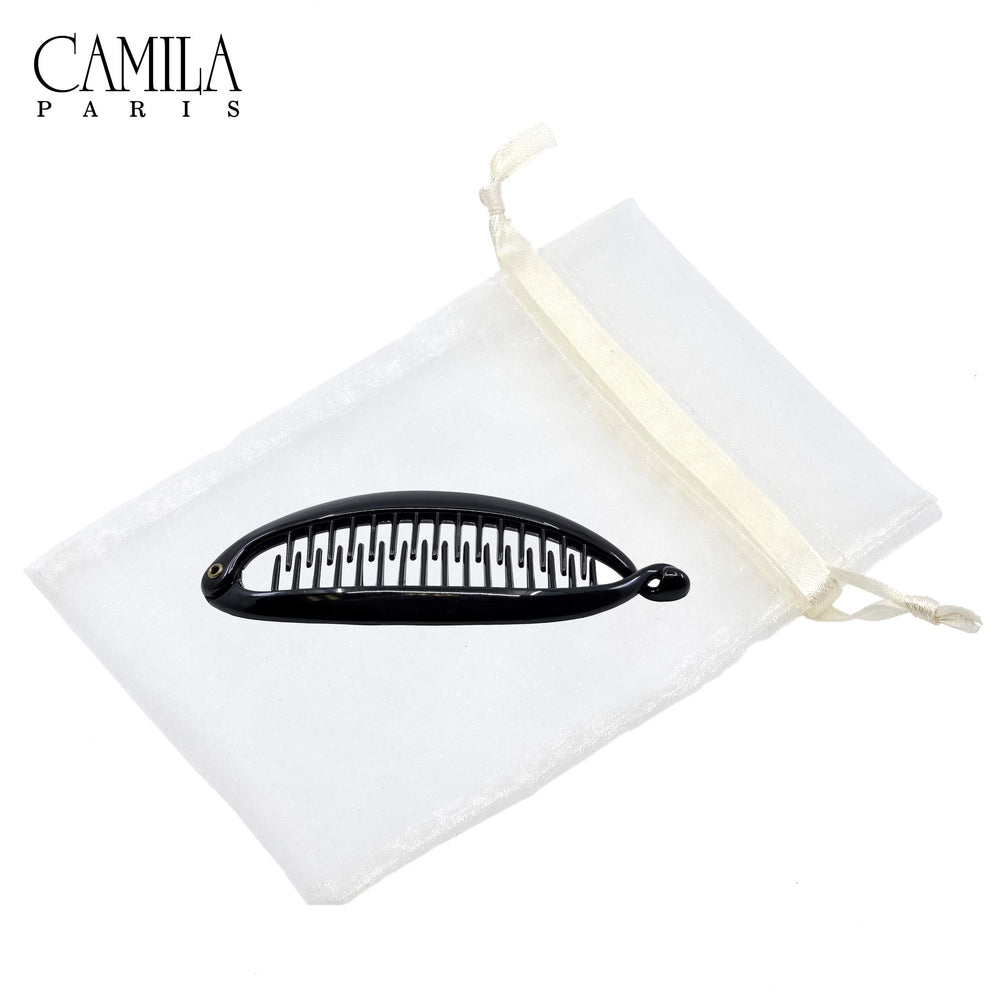 Camila Paris used in half-up hairstyle to add volume and neatness
