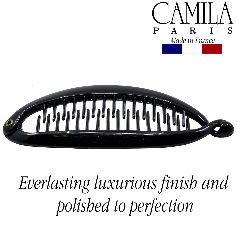 Camila Paris next to ruler showing 4.5 inch size for scale