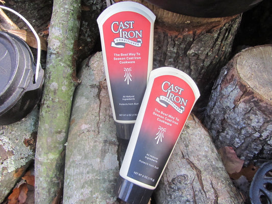 Close-up of Camp Chef conditioner texture demonstrating easy spreadability