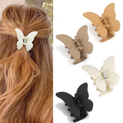 Canitor front view of four neutral butterfly clips showing color options and neat design