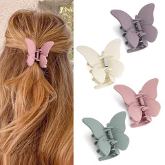 Canitor butterfly clip front view showing shape and secure hold