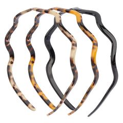 Canitor headband front view showing tortoise finish and sleek shape for stylish comfort