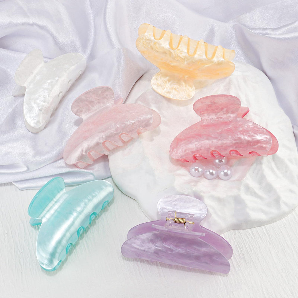 Canitor clip holding a full bun to keep hair tidy during activities