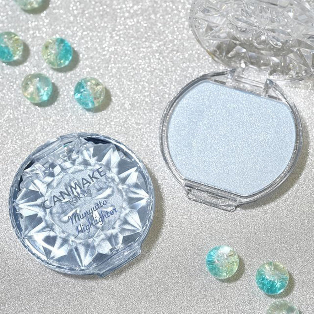 CANMAKE Munyutto beside coin showing compact size and travel-friendly convenience benefit