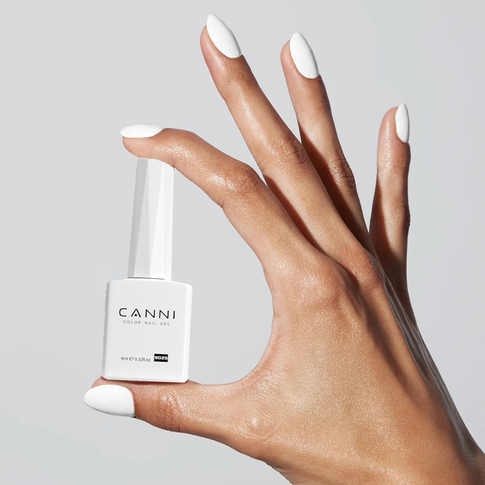 CANNI white gel painted on natural nails showing glossy, durable finish