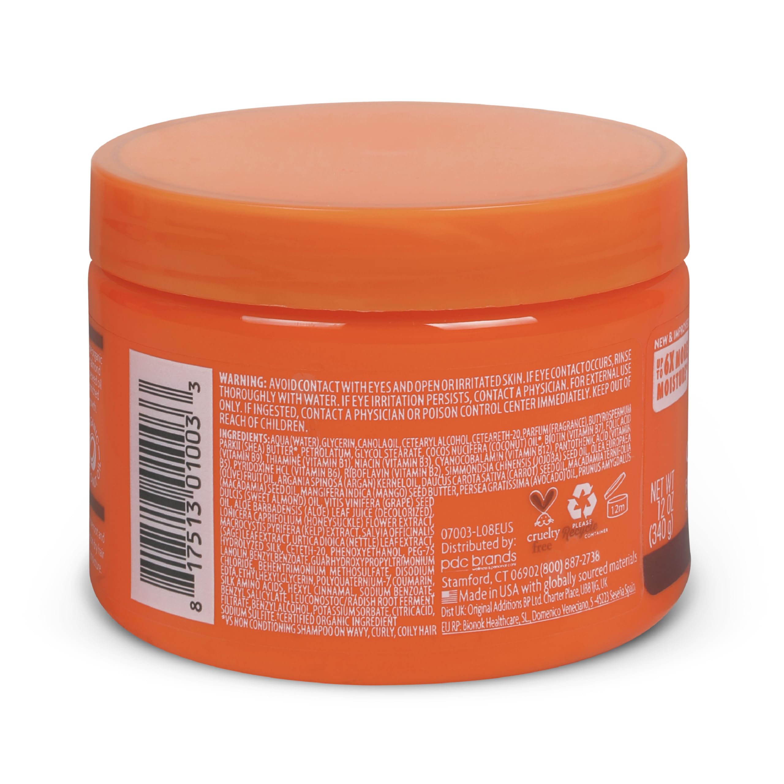 Cantu jar open to reveal creamy coconut-shea texture for smooth application