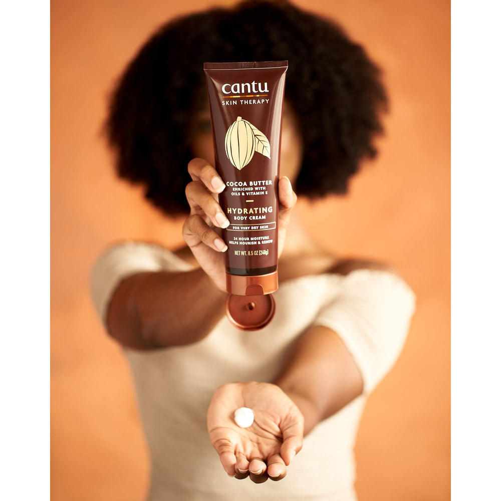 Closeup of Cantu cream texture demonstrating rich, fast absorption benefit