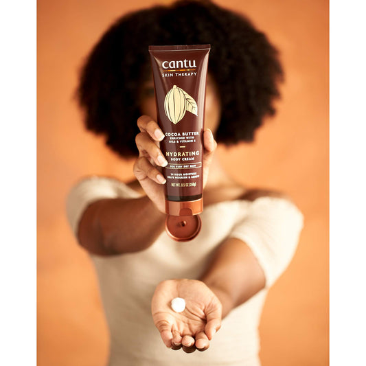 Closeup of Cantu cream texture demonstrating rich, fast absorption benefit