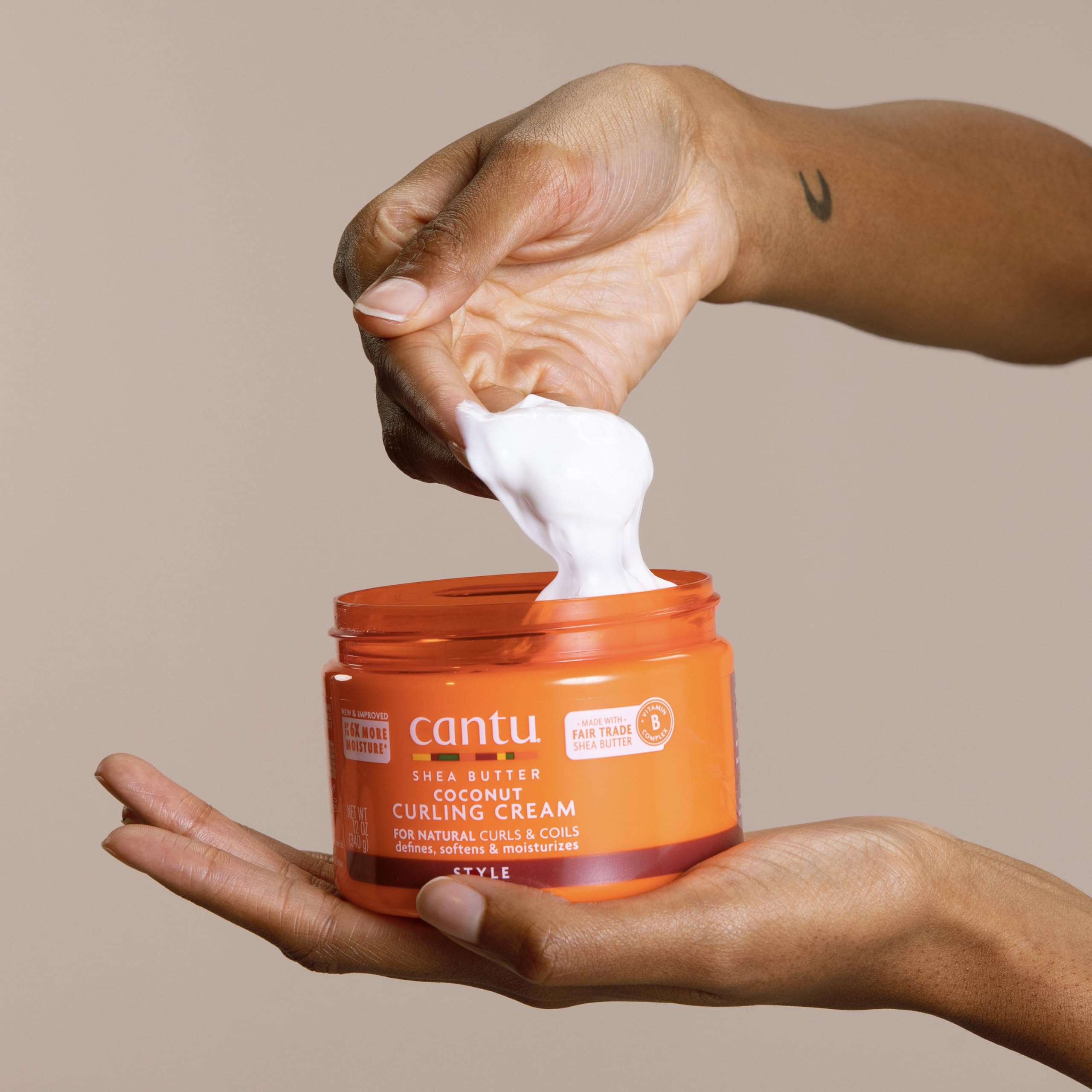 Label close-up on Cantu jar showing ingredient claims and cruelty-free benefit