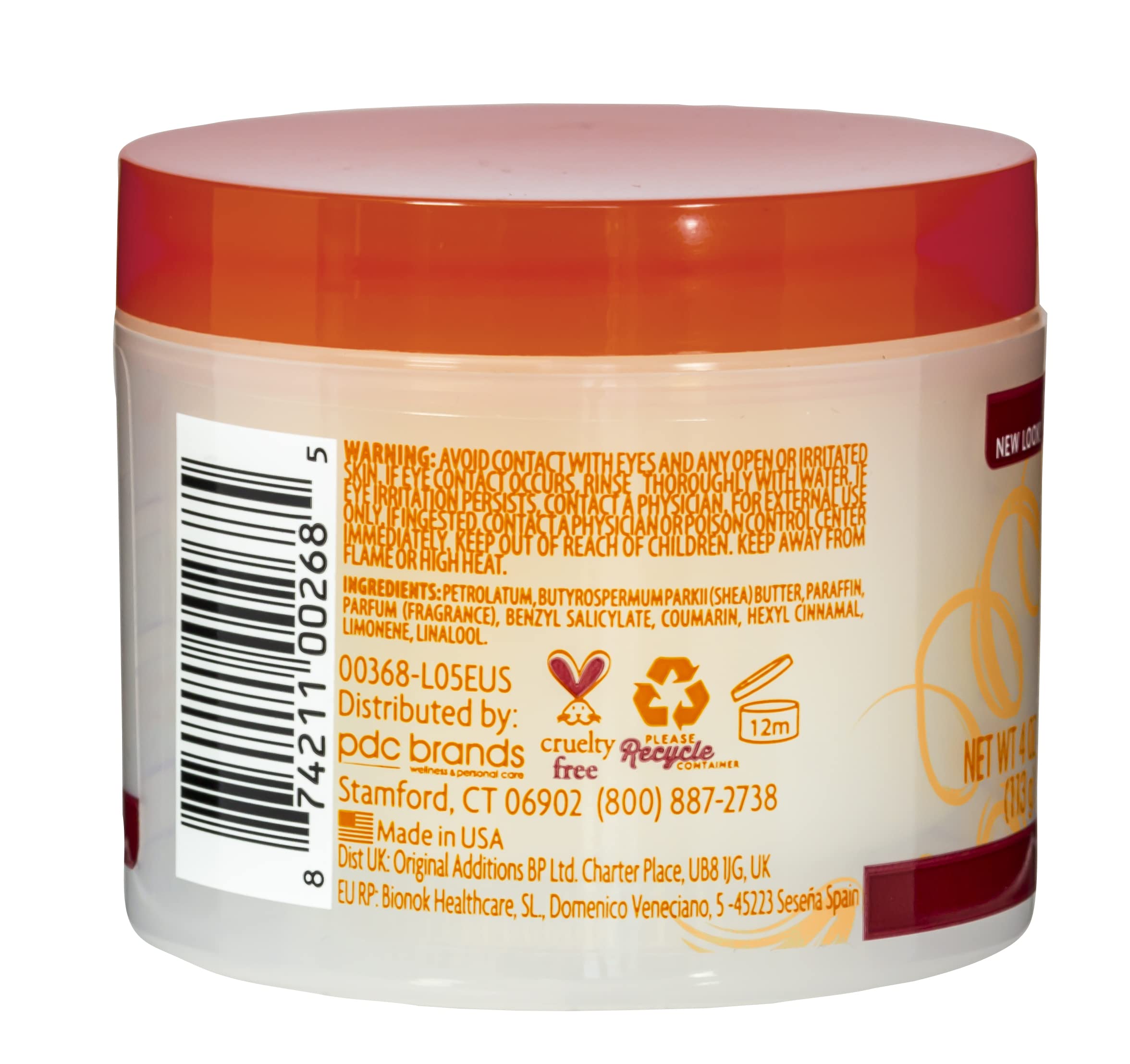 Cantu pomade in use styling hair demonstrating control and defined shine