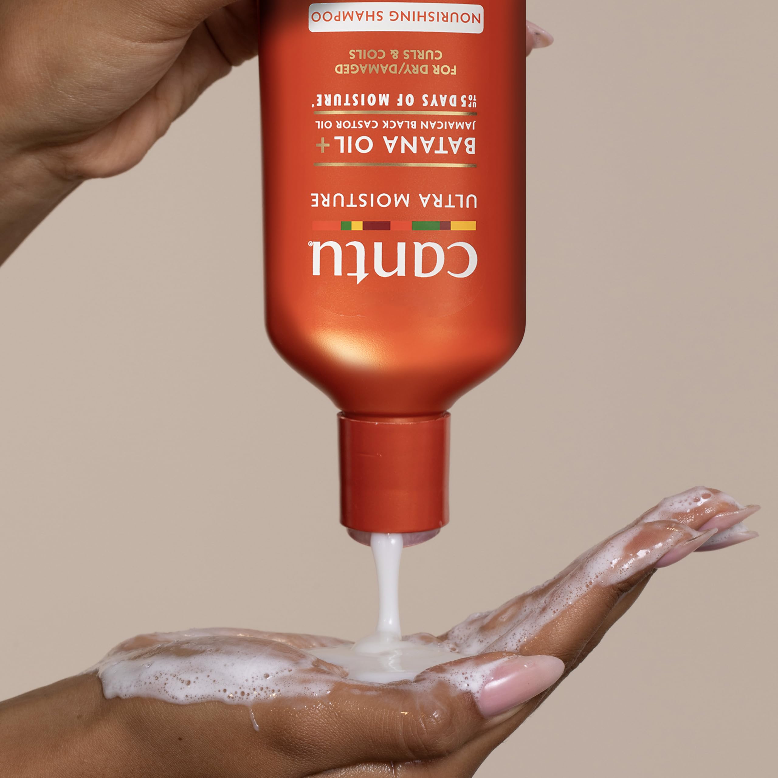 Cantu shampoo pouring into hand illustrating easy application