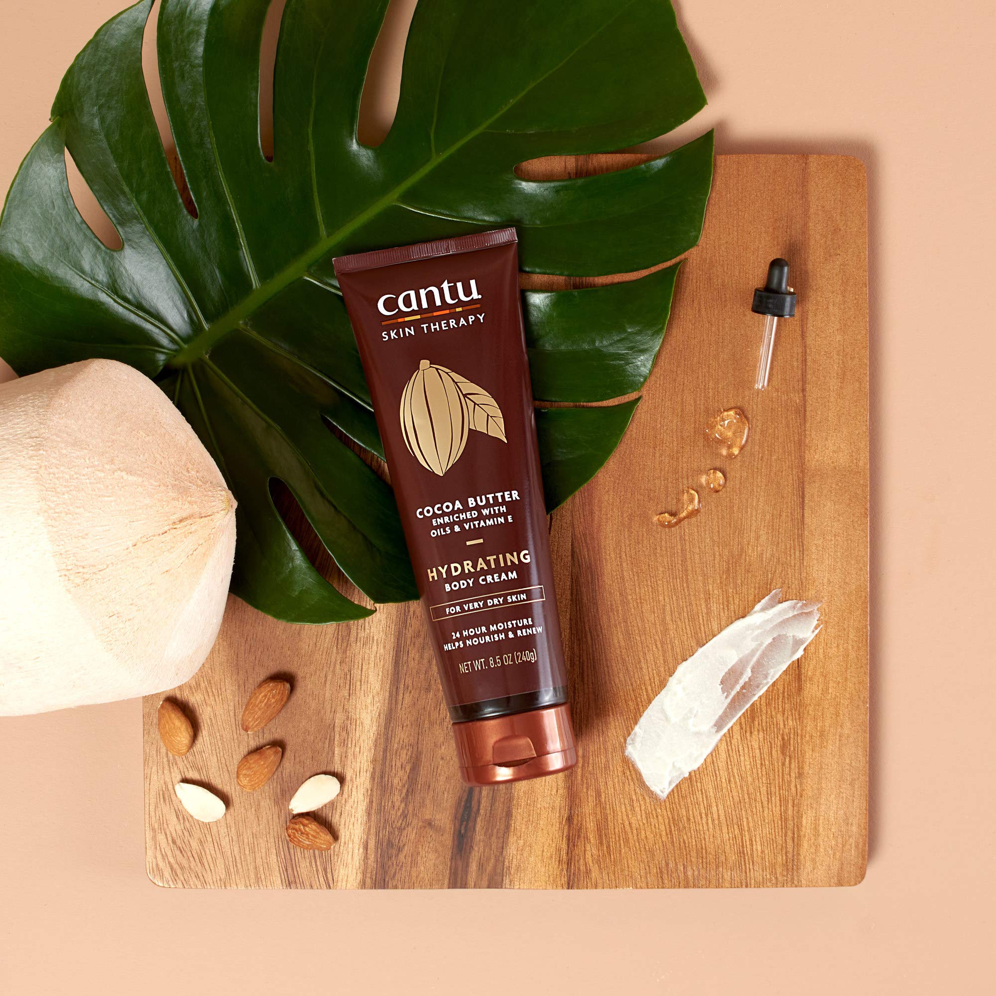 Cantu jar in hand for size comparison, showing travel‑friendly benefit