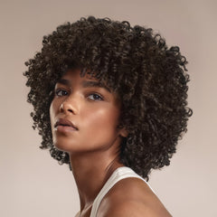Cantu leave-in in palm demonstrating smooth application and slip