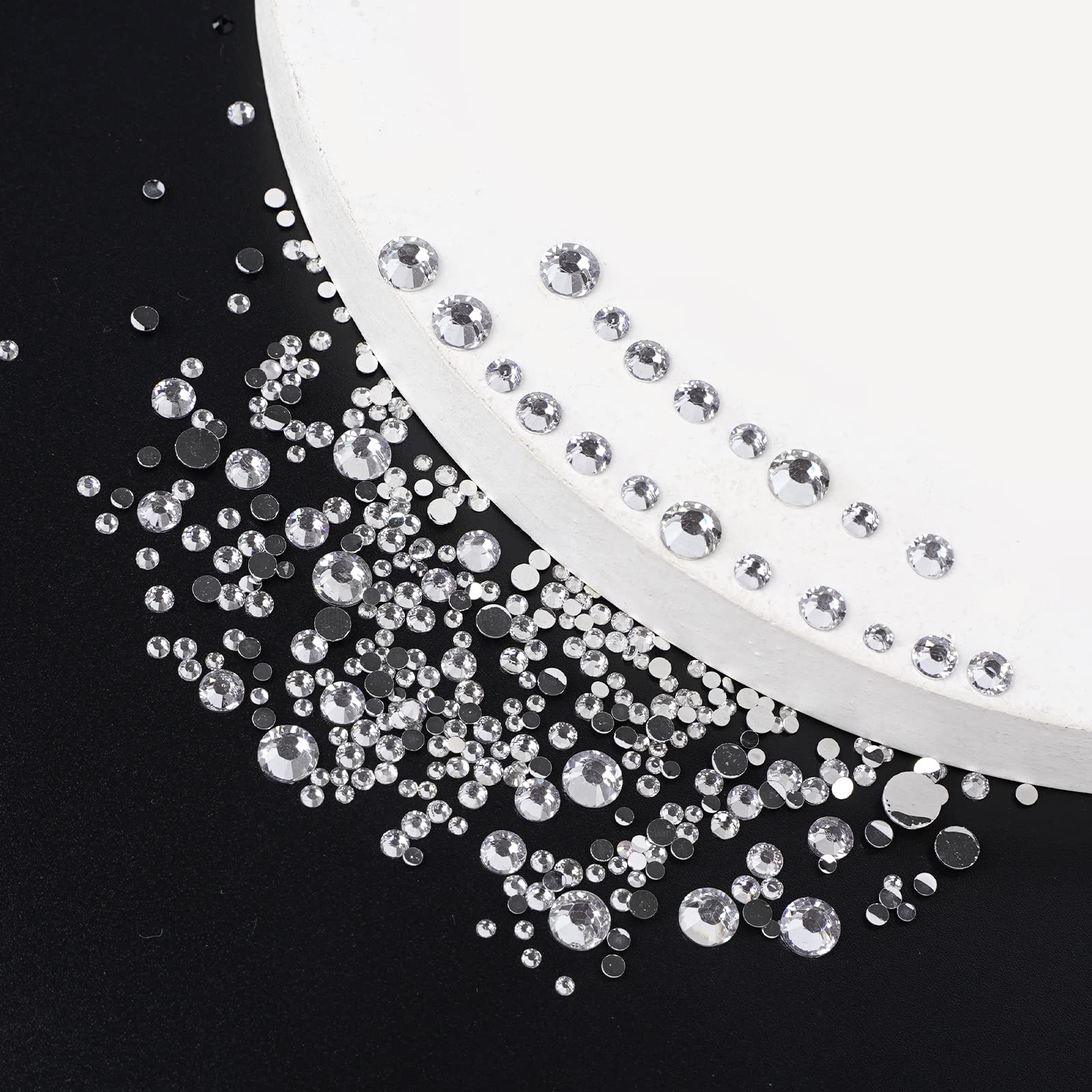 Canvalite rhinestones applied on nails showcasing professional-looking sparkle