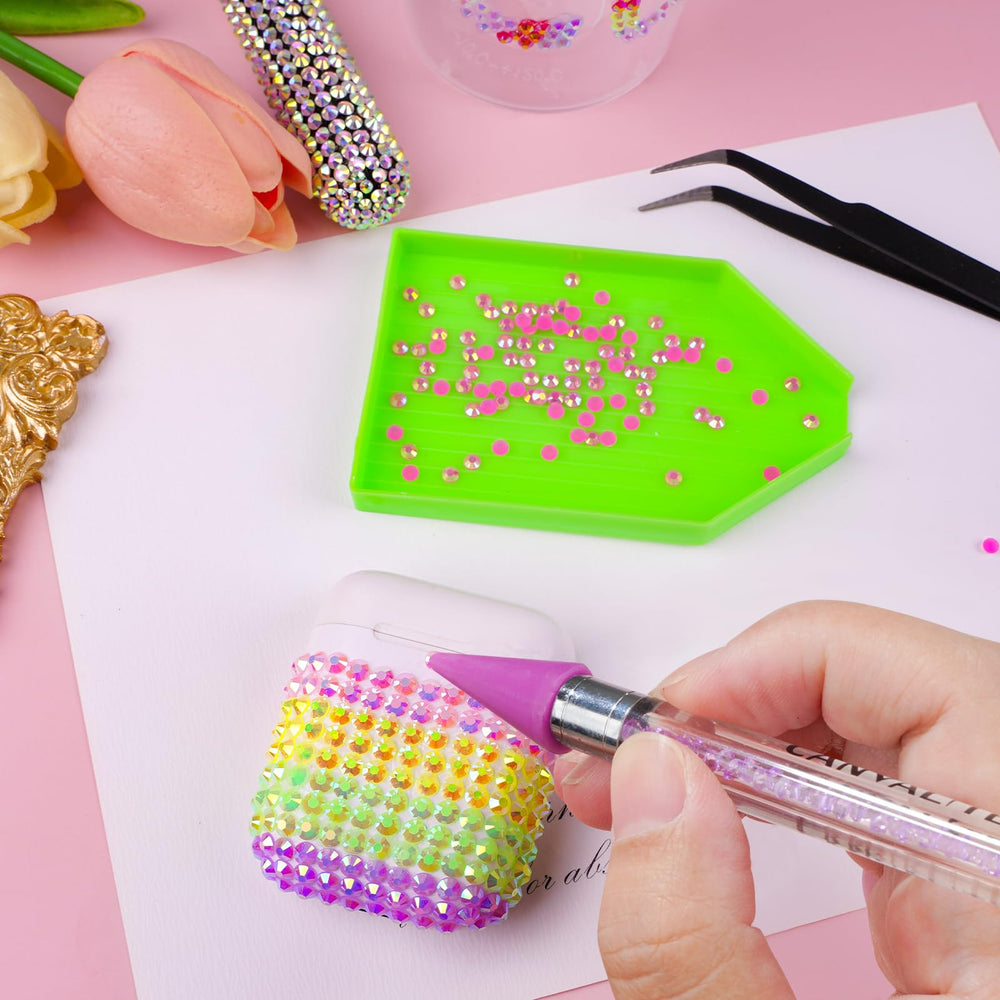 CANVALITE rhinestones being applied to nails demonstrating easy decorative use