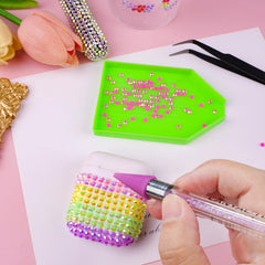 CANVALITE rhinestones being applied to nails demonstrating easy decorative use