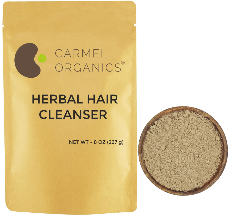 CARMEL ORGANICS front label of 8 ounce herbal hair cleanser showing product name and benefits