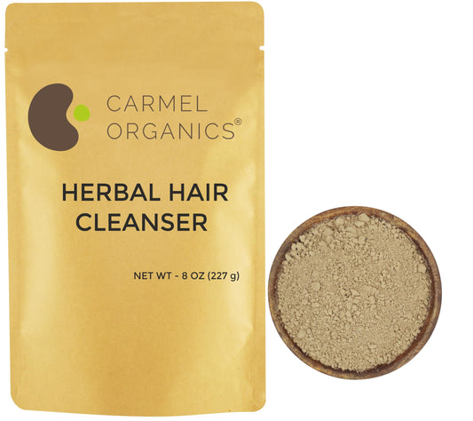 CARMEL ORGANICS front label of 8 ounce herbal hair cleanser showing product name and benefits